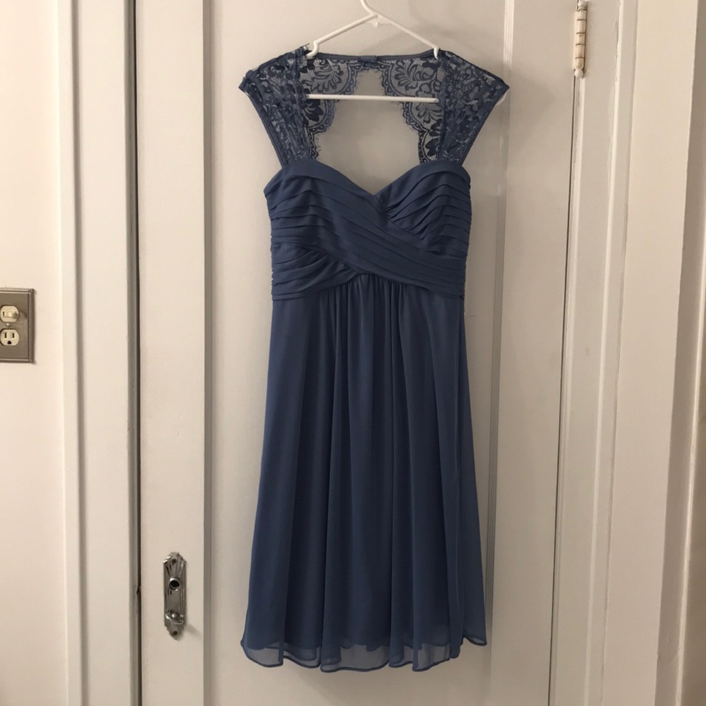 Knee length formal dress with lace shoulders